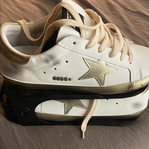 Golden Goose Cream and Black Superstar Sneakers